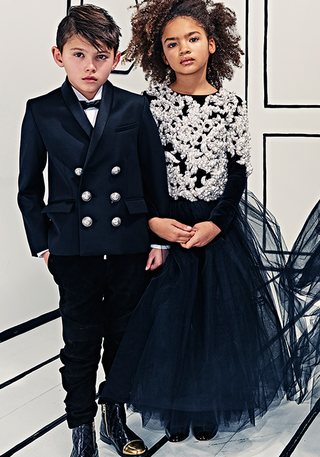Balmain’s Rousteing doing it for the kids.